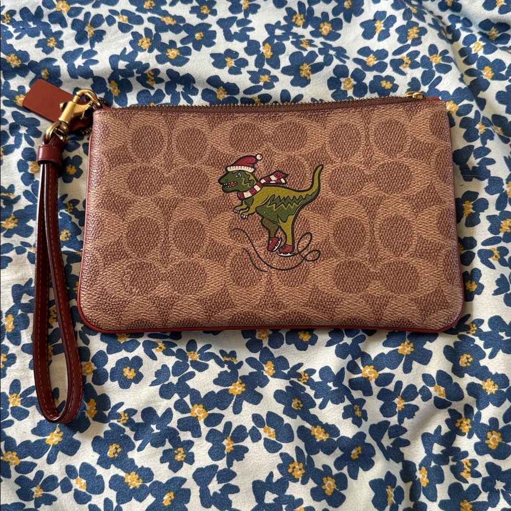 Coach Tan Wristlet with Festive Dinosaur REXY
